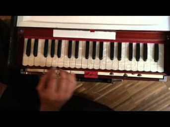 hand-on-harmonium